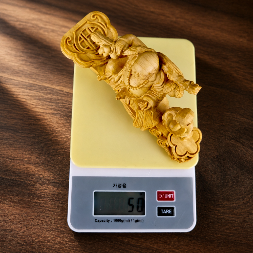 포대화상불상 포대화상불상을 전자저울에 올려 약 50g 무게를 확인하는 모습 이미지